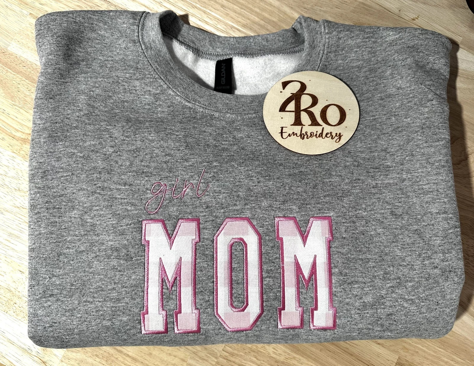 Gray sweatshirt with pink gingham appliqué MOM letters and girl in pink script